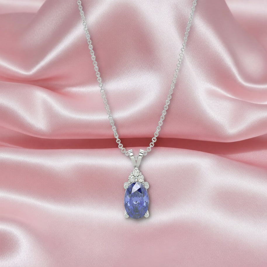 1.50 Ct Oval Tanzanite & Diamond Pendant In 18k White Gold